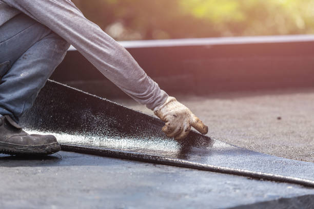 Professional Interior Drainage System technician working in Baldwin, NY